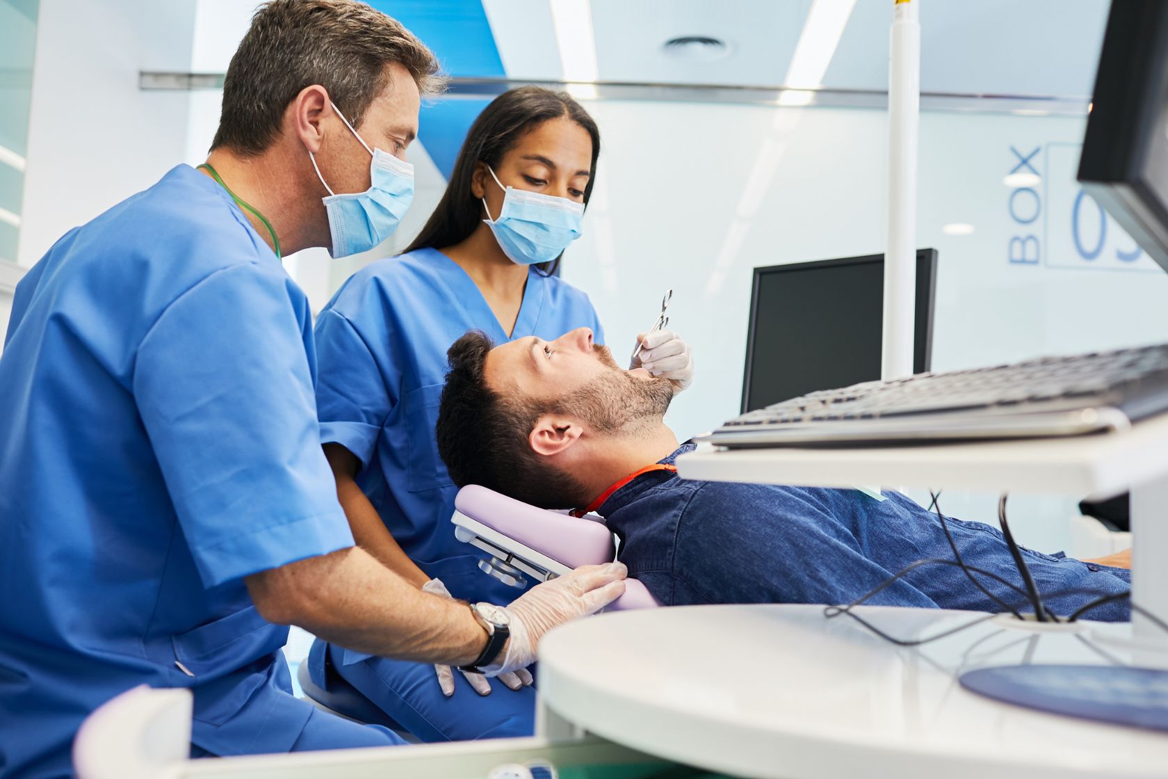 dentists with patient