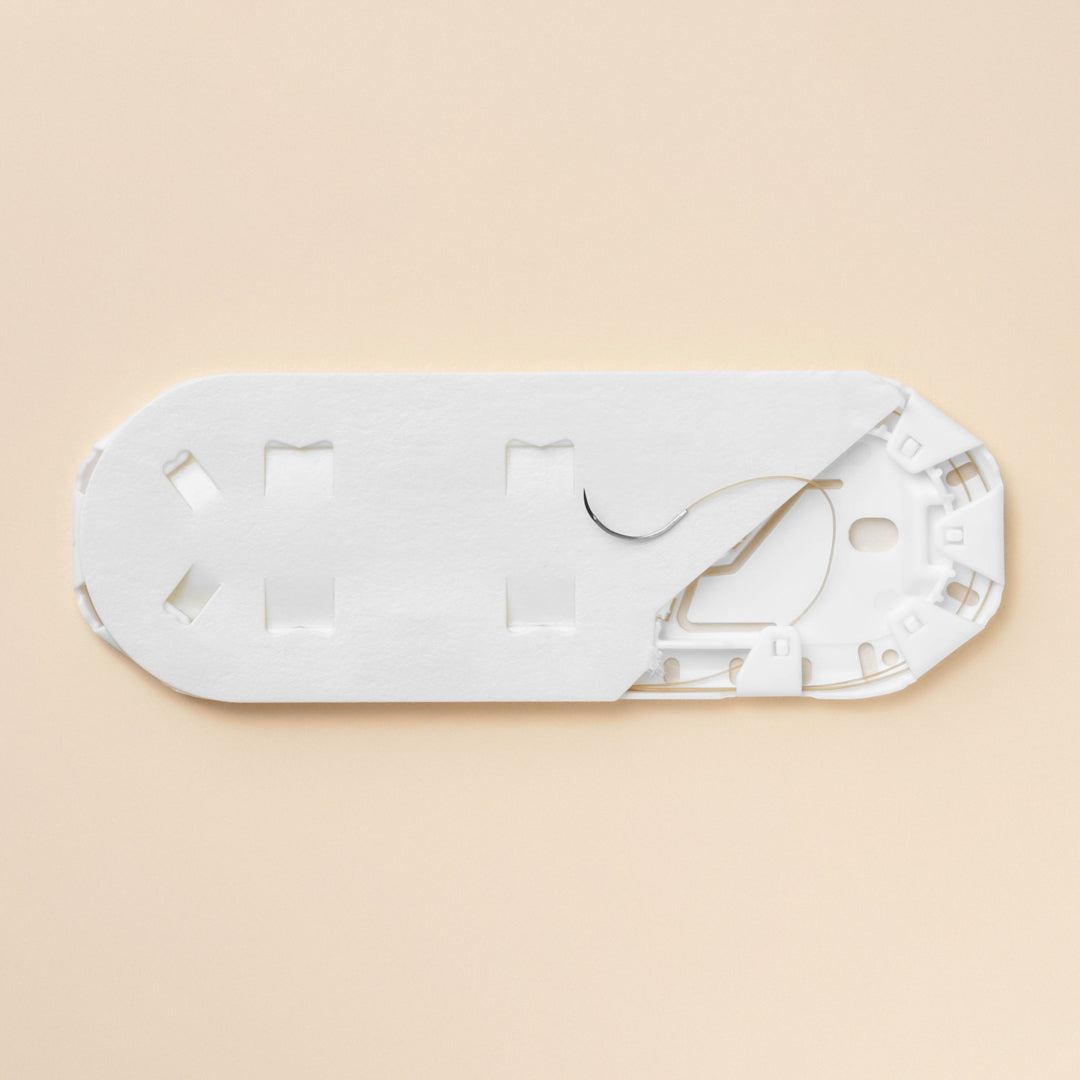 Ethicon's 1654G Chromic Gut suture package, displaying a 4-0 suture size and an 18-inch length with a P-3 reverse cutting needle. The box highlights the suture's natural brown color and absorbable properties, indicating its suitability for a range of surgical applications.