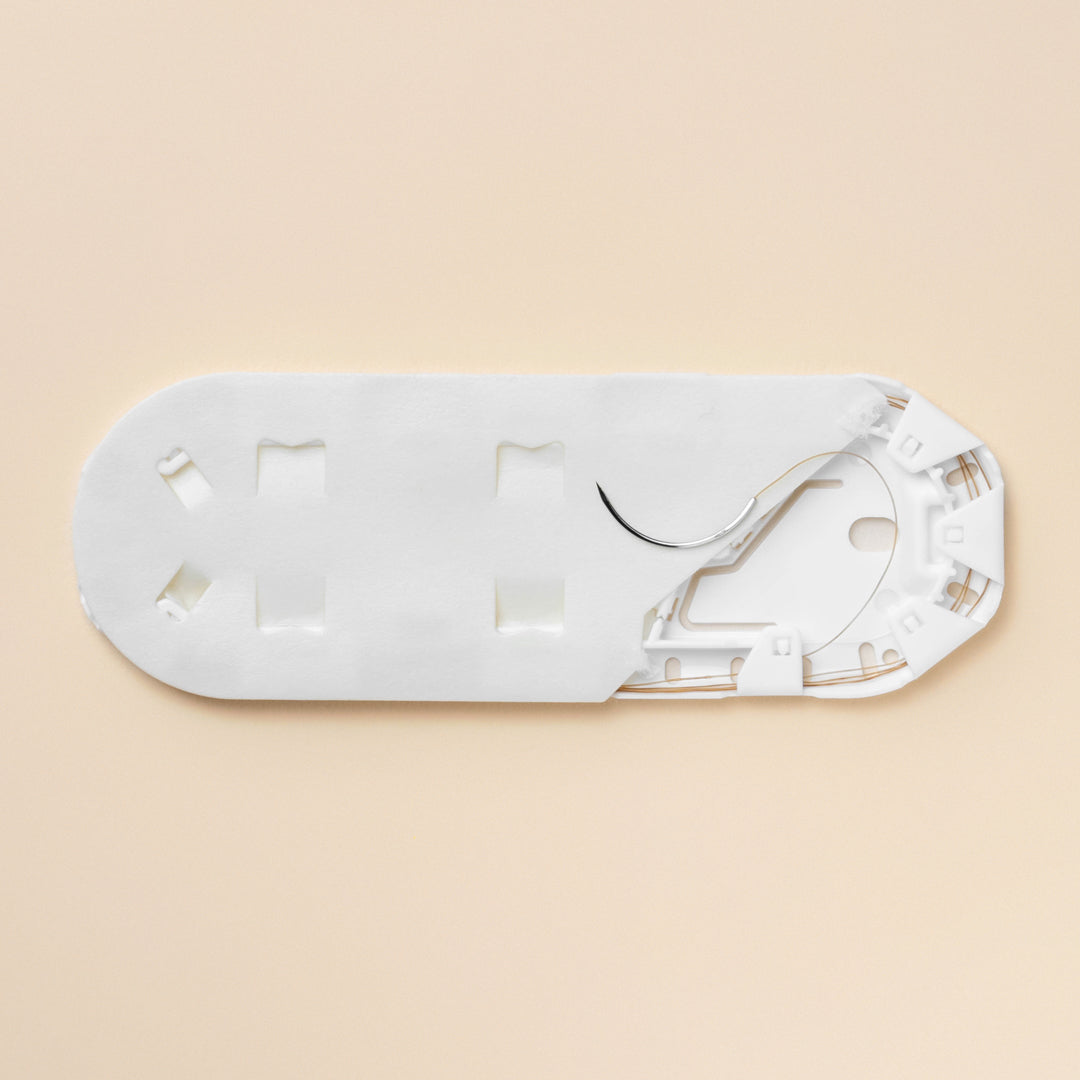 Image depicting a box of ProNorth Medical Corporation's 5-0 Chromic Gut Sutures 634G, showcasing the dyed brown sutures equipped with an FS-2 reverse cutting needle, designed for precision and ease of use in various surgical procedures.