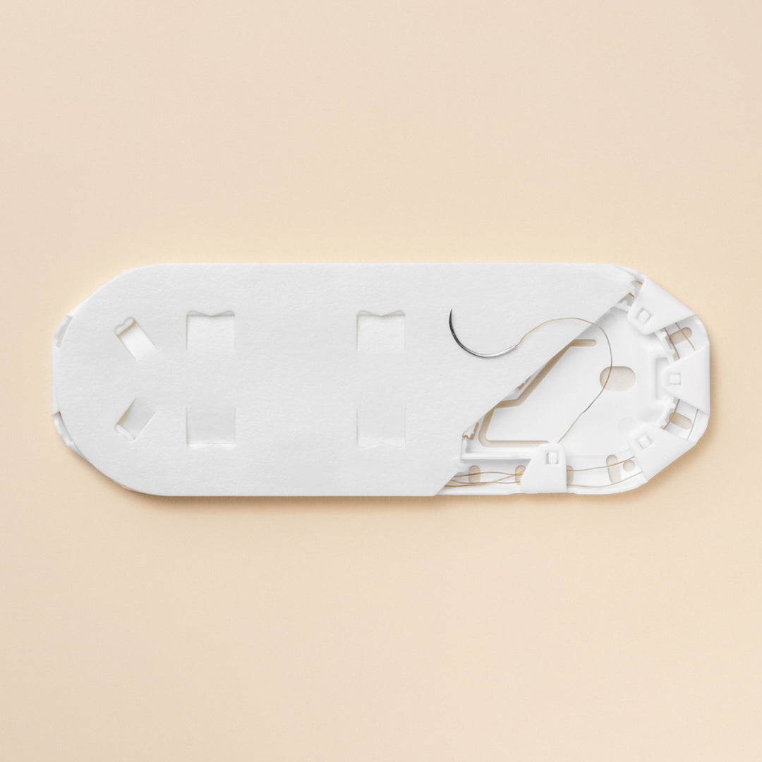 A box of ProNorth Medical Corporation's 5-0 Chromic Gut Sutures, model 687G, with an 18-inch length and equipped with a silver P-3 reverse cutting needle, tailored for intricate surgical applications and packaged to facilitate ease of use for medical professionals