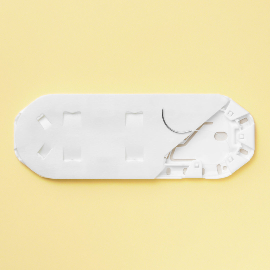 Box of 5-0 Surgical Gut Suture - Plain, model number 1626G, featuring yellowish tan absorbable sutures with a 16mm PS-3 reverse cutting needle. Designed for optimal performance in delicate surgical applications, highlighting the suture's natural composition and specialized needle for minimal tissue impact.