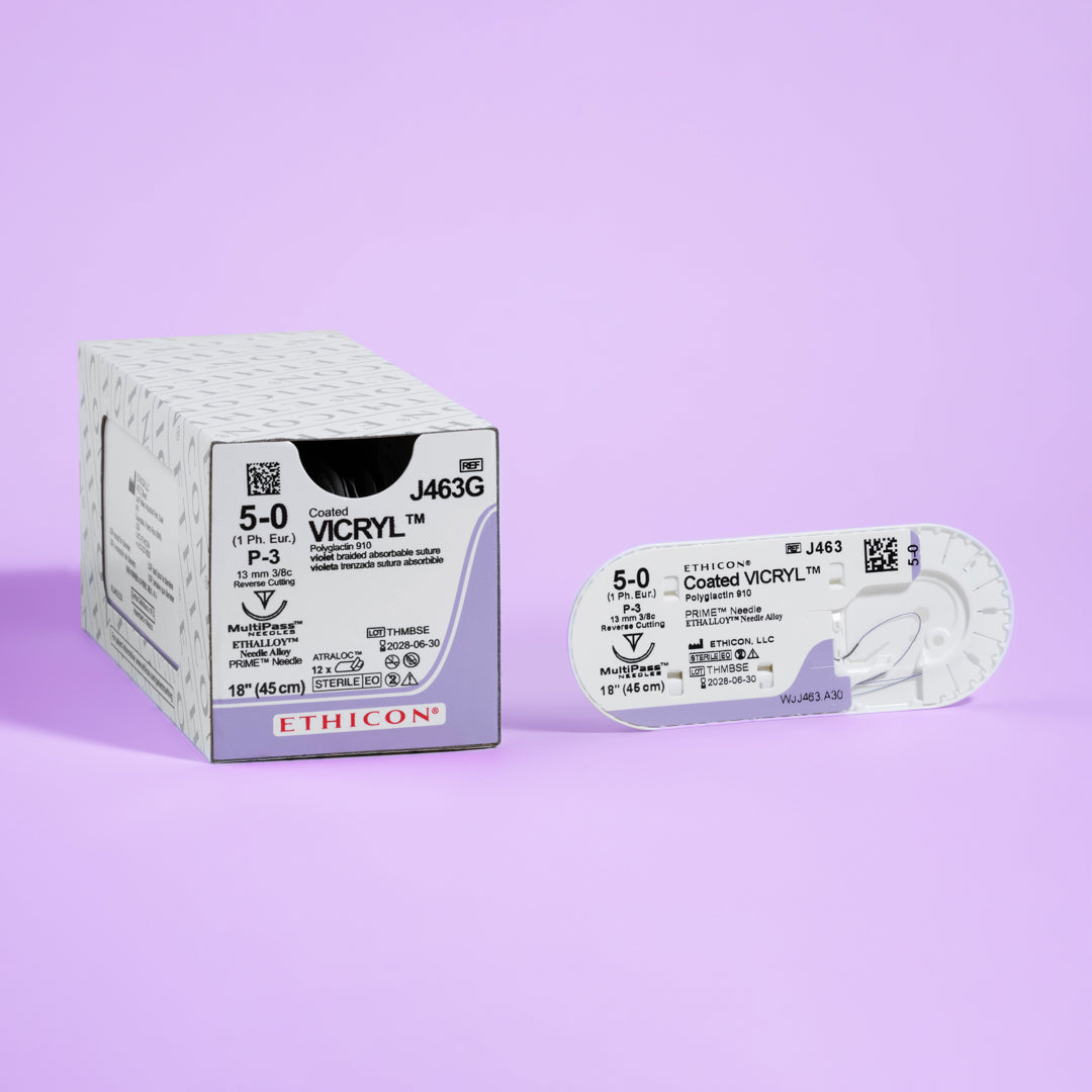 Box of COATED VICRYL® 5-0 Violet Sutures, model J463G, displaying the sutures equipped with a 13mm P-3 prime reverse cutting needle. The sutures' violet color enhances visibility during surgery, packaged in a set of 12 for specialized surgical applications, emphasizing ease of use and patient comfort.