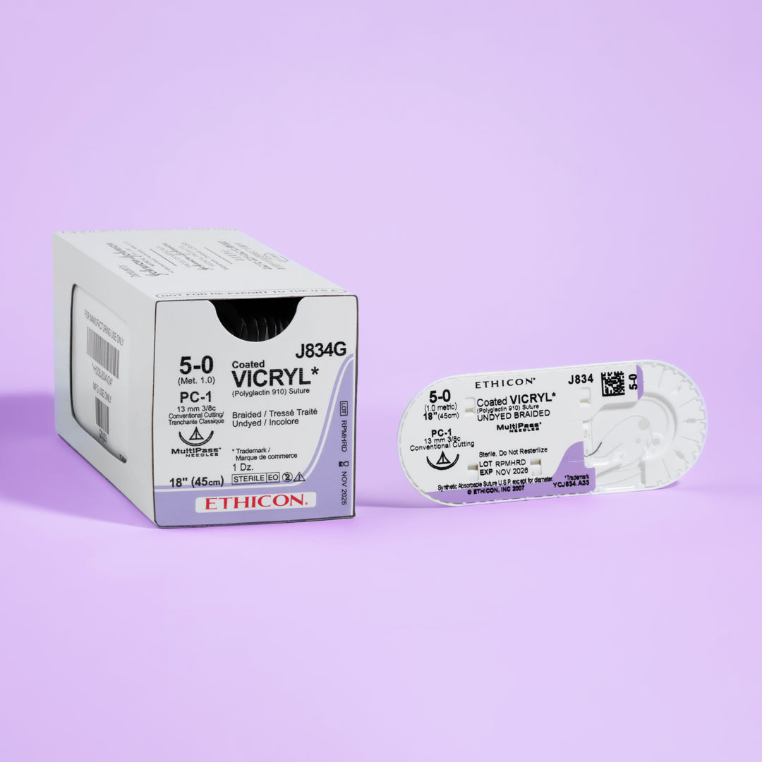 Packaging of COATED VICRYL® 5-0 undyed sutures, model J834G, showcasing the 13mm PC-1 conventional cutting needle. Designed for a broad spectrum of surgical applications, these sutures are highlighted for their absorbable material and commitment to surgical excellence.