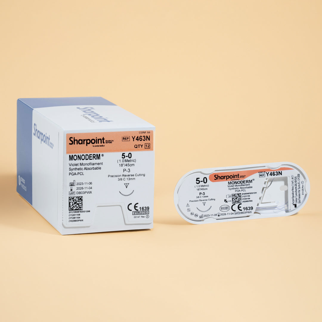 Sharpoint Monoderm Y463N 5-0 suture box and suture packaging, showcasing a violet monofilament suture of 18 inches with a P-3 precision reverse cutting needle. The box highlights its use for delicate surgical applications, emphasizing the suture's advanced PGA-PCL material for optimal performance and patient comfort