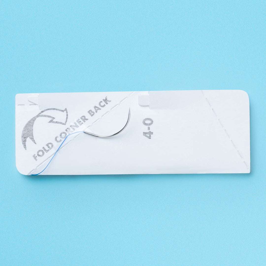 Sharpoint 4-0 Polypropylene suture (J8683N) box and individual package, showcasing the blue monofilament suture and FS-2 reverse cutting needle. This suture is tailored for medical professionals requiring precision and durability in various surgeries, highlighted by its design for minimal tissue reaction and enhanced surgical visibility.