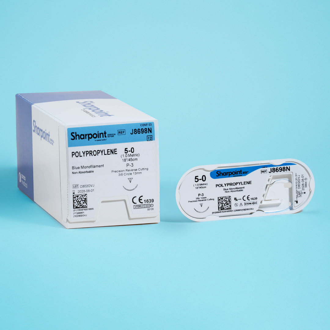 A box and individual packet of Sharpoint 5-0 blue polypropylene suture (J8698N) with an 18-inch length and a P-3 precision reverse cutting needle, ideal for detailed surgical applications. The non-absorbable monofilament suture is highlighted for its use in dental and cosmetic surgeries, emphasizing its high-quality manufacture and suitability for procedures requiring exceptional suturing precision.