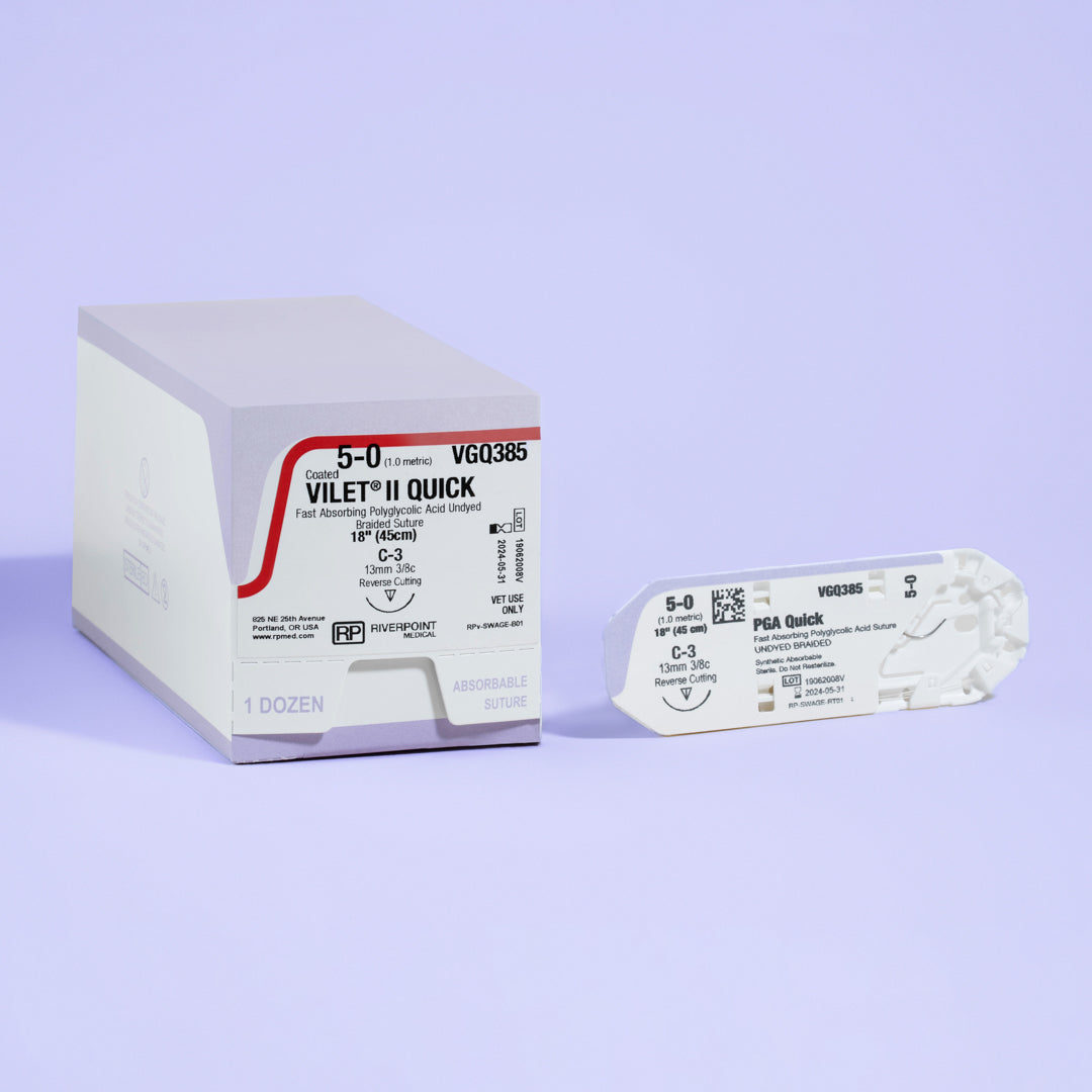 A box and individual pack of VILET® II QUICK 5-0 suture (VGQ385) featuring a 13mm reverse cutting needle for veterinary use. This fast-absorbing, polyglycolic acid, undyed braided suture is specially designed for veterinary professionals seeking quick healing and minimal tissue reaction in animal surgeries. The packaging underscores its veterinary application, ensuring high-quality and reliability in animal healthcare procedures
