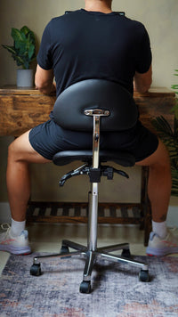 Working at a desk — rear support view